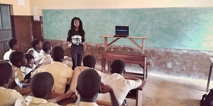 Olanike Tidjani teaching students in a classroom in Benin